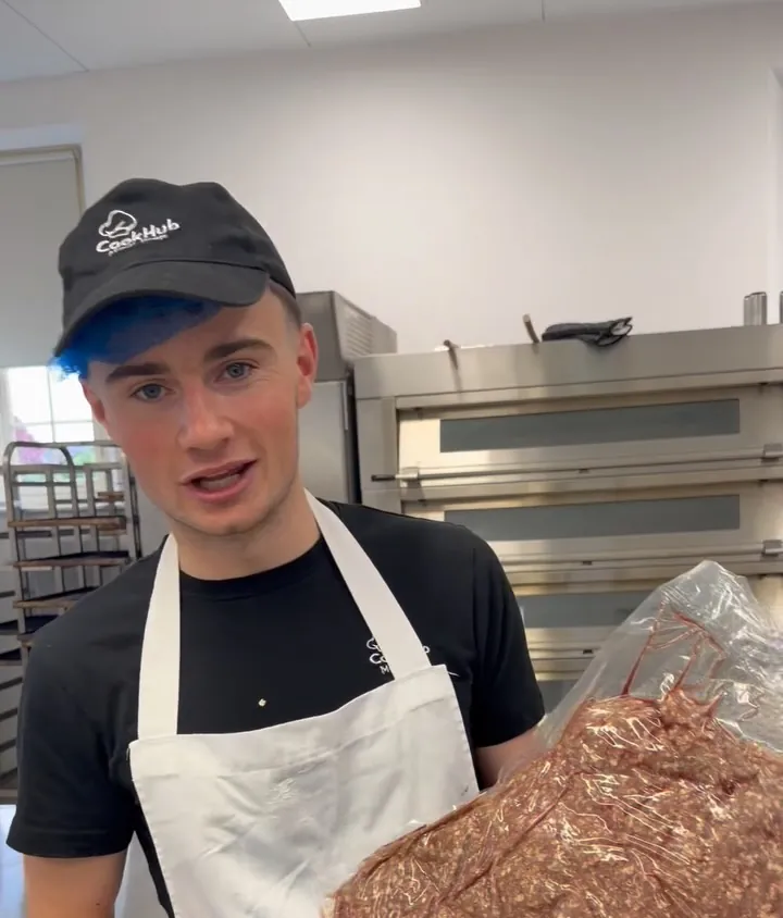 Jay holding a tray of beef mince from the local butcher