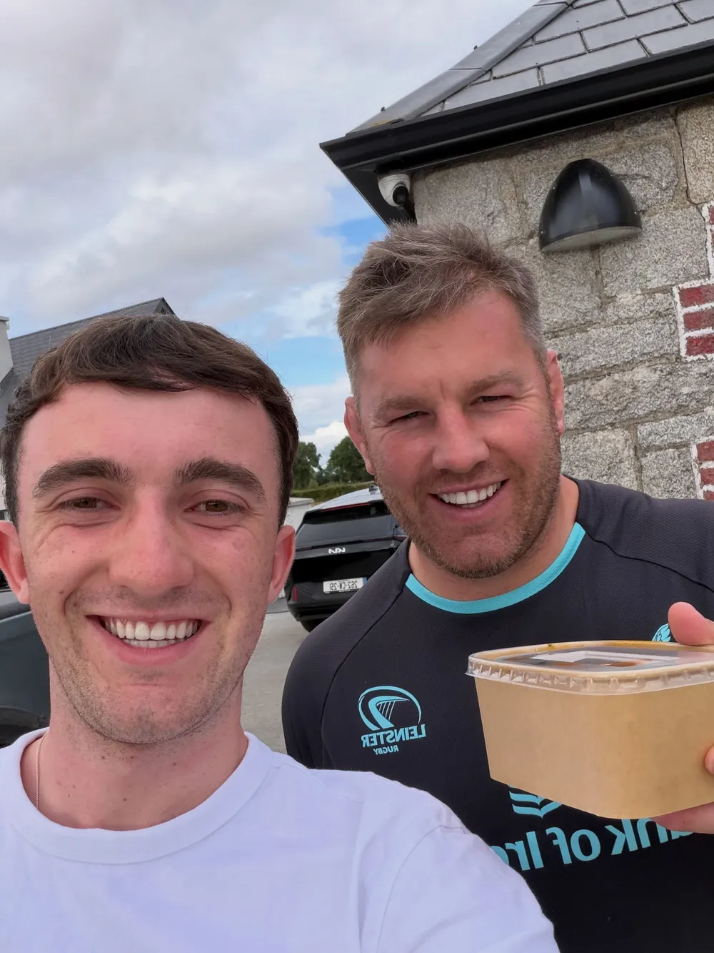 A customer collecting his box